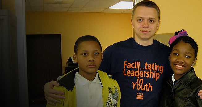 Joshua Worger, Abroad at AU student, with two students he mentored through Facilitating Leadership in Youth (FLY).